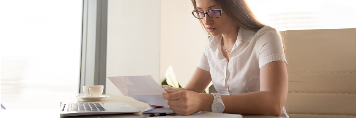 Lady calculating the debt