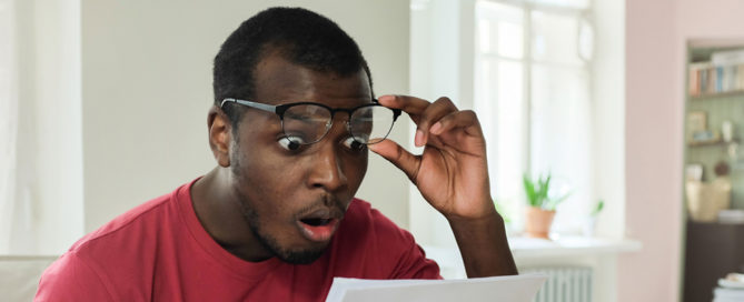 Man Reading Document